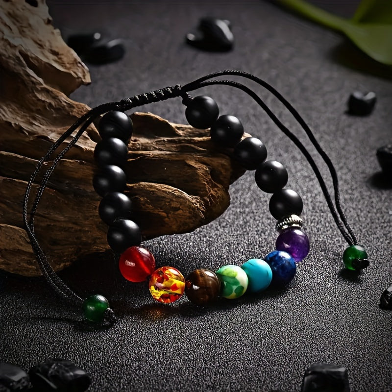 Adjustable stretch bracelet made of natural lava rock beads with 7 chakras healing properties, featuring a simple tribal style. Perfect for daily wear or special occasions to promote balance and meditation.