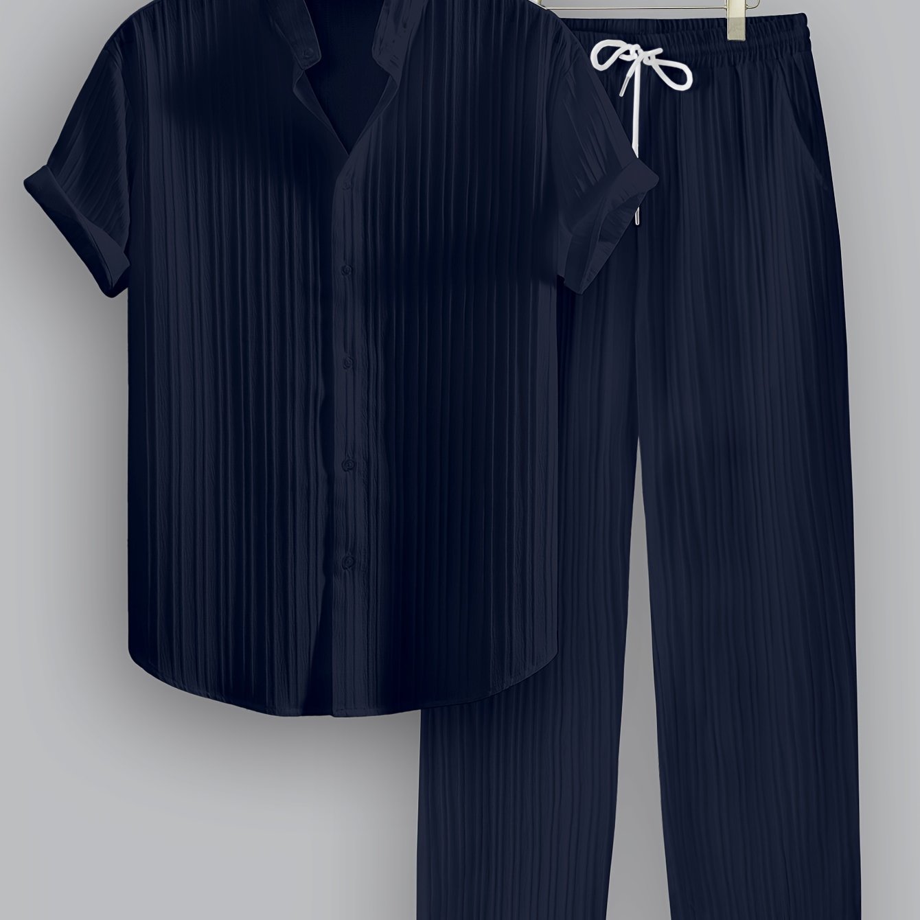 Two-piece men's summer outfit set includes a short sleeve stand collar shirt and drawstring pants in non-stretch woven fabric. Regular fit perfect for daily wear and beach vacation.