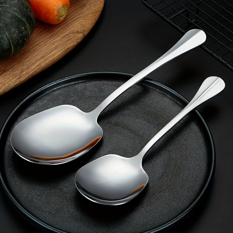 2 pieces of stainless steel serving spoons for catering events and parties.