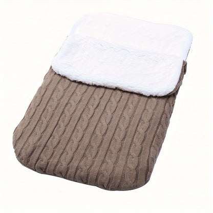 Machine washable baby foot cover with knitted microfiber filling for warmth and comfort.