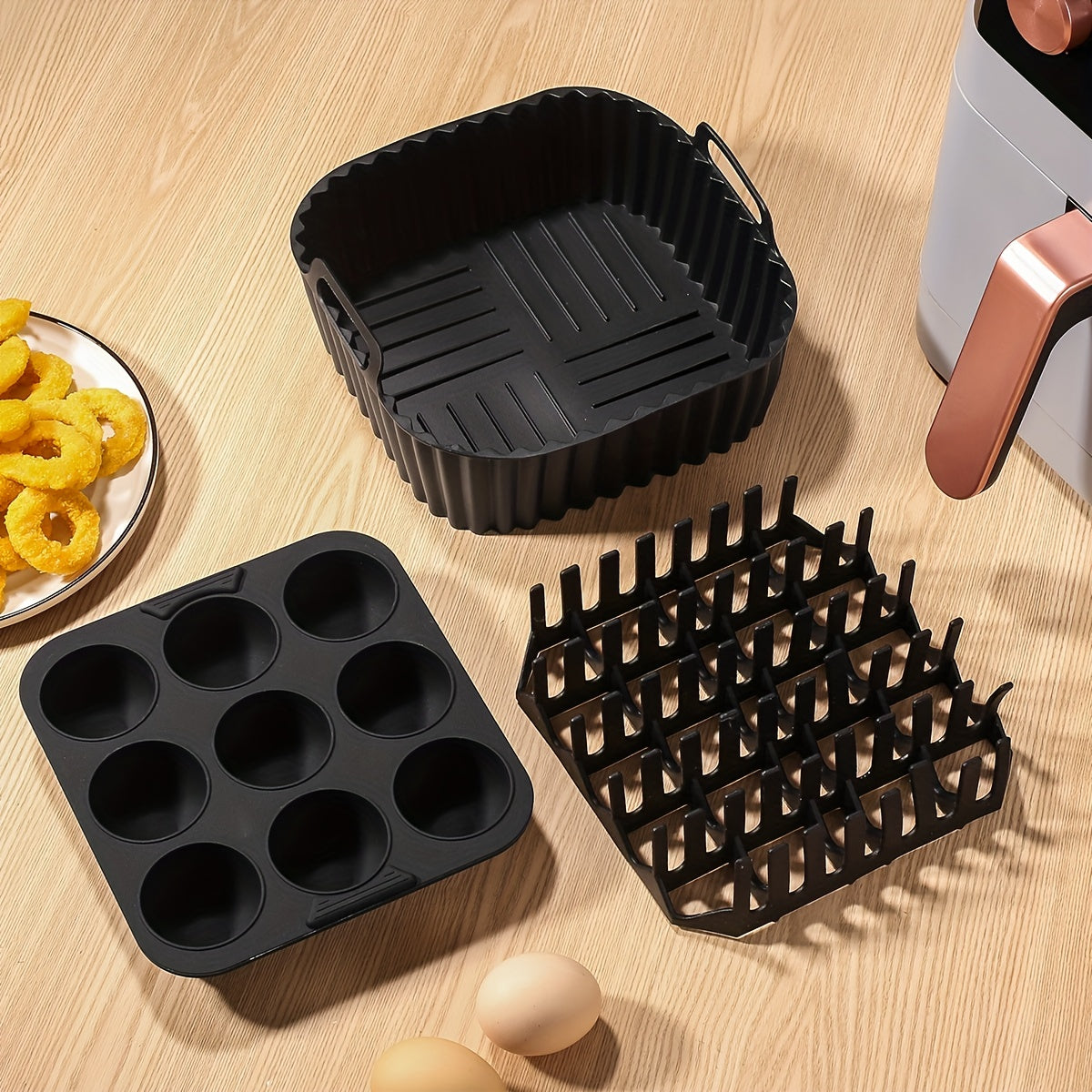 1 set of square silicone air fryer accessories, including a 19.0 cm bacon & hot dog rack, a 9 cavity cake mold, and an air fryer liner. These accessories are BPA-free, dishwasher safe, and compatible with 7QT+ air fryers in black color.