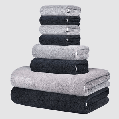 This 8-piece set includes 2 bath towels (68.58 X 139.7 cm), 2 towels (34.8 X 74.93 cm), and 4 square towels (29.97 X 29.97 cm). They are super soft, quick-drying, absorbent, and