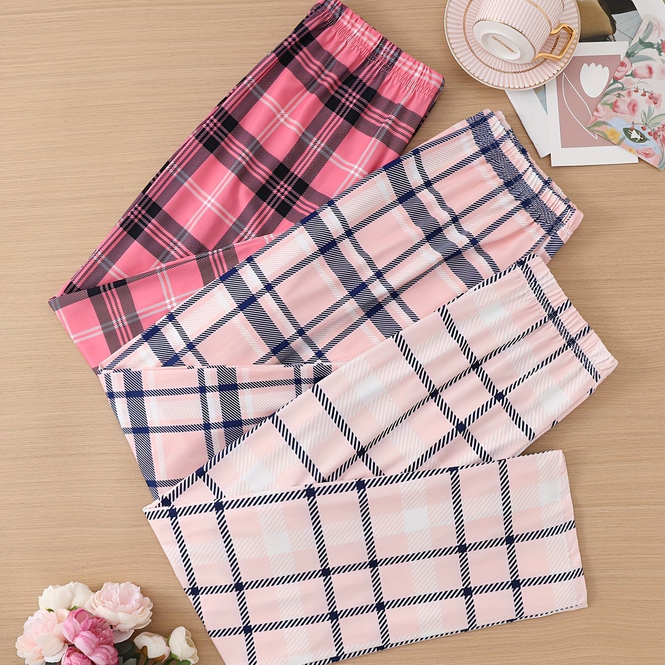 3 Casual lounge pants with plaid print, elastic high waist, and loose fit for women's sleepwear and loungewear.