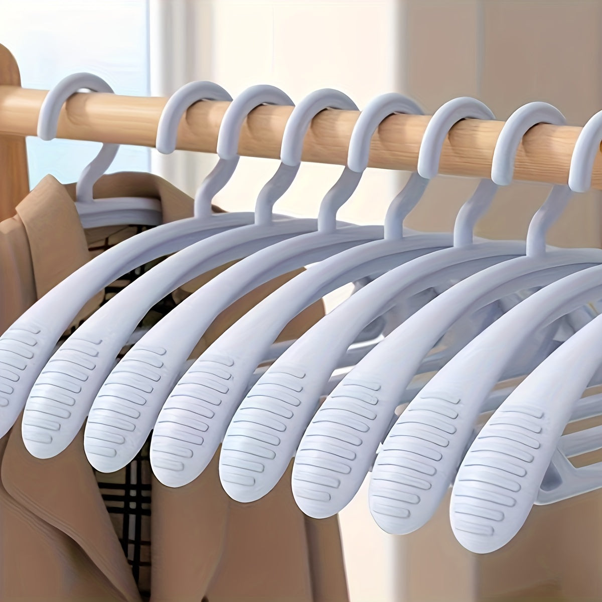 Luxurious wide shoulder hangers - Set of 10, Strong, Anti-Twist, Mark-Free Clothes Storage Solution.