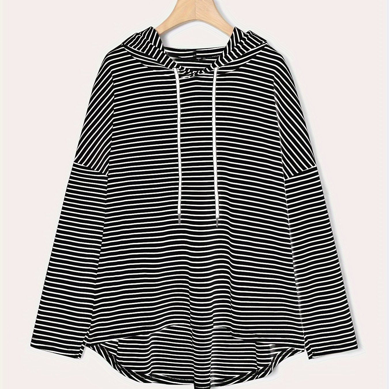 Oversized hoodie with stripes, drawstring, and machine washable polyester blend fabric, perfect for a casual and comfortable look in spring/fall.