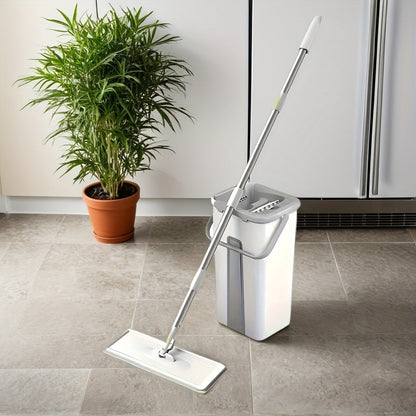 The perfect home cleaning tool for any surface - the Versatile Flat Mop and Bucket Set comes with 2/4 reusable pads for easy wringing and drying. Ideal for kitchen, bathroom, tile, and hardwood floors.