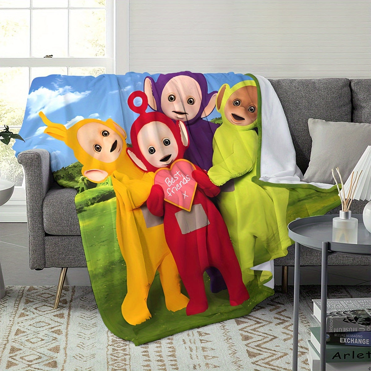 Soft HD digital print throw blanket inspired by Teletubbies, can be used on the sofa, bed, or for office naps. It is cozy, lightweight, and machine washable. Made of hypoallergenic polyester, it is ideal for all seasons and makes a great gift for friends