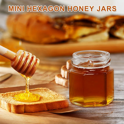 Small hexagonal glass honey jars come in 1.5 oz sizes in sets of 20, 30, 50, or 60. Each jar includes a spoon, bee symbol, and thank you card. They have golden lids and are ideal for baby gifts, weddings, and parties.