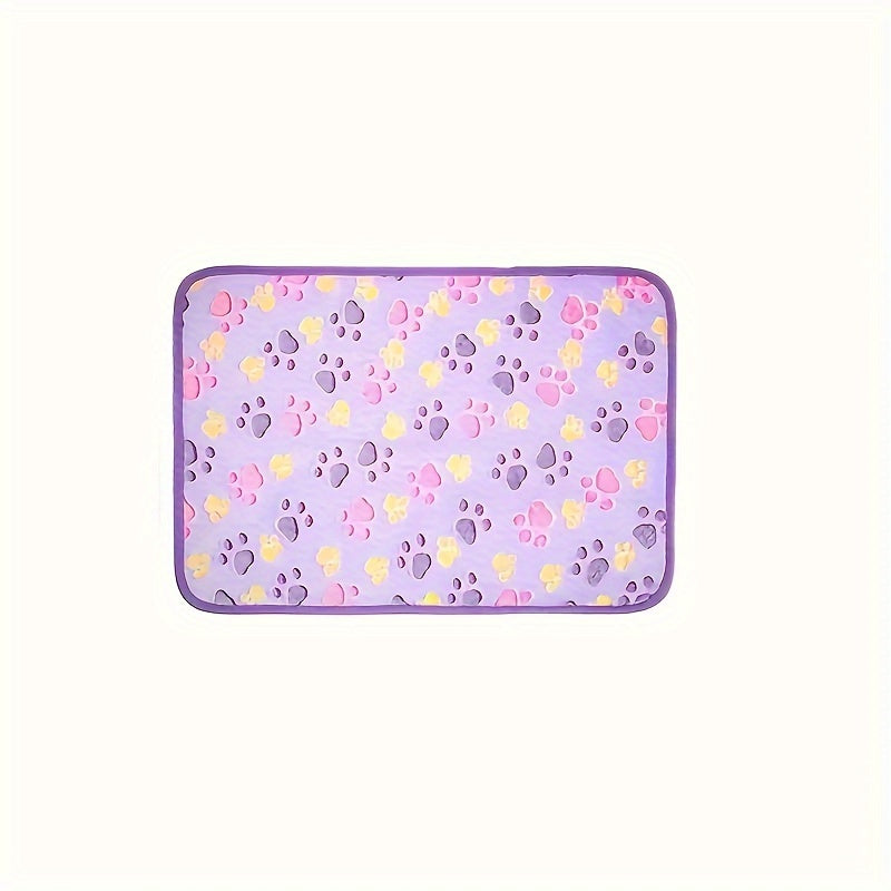 Paw print patterned pet fleece blanket, machine washable and stain resistant, suitable for all dog sizes.