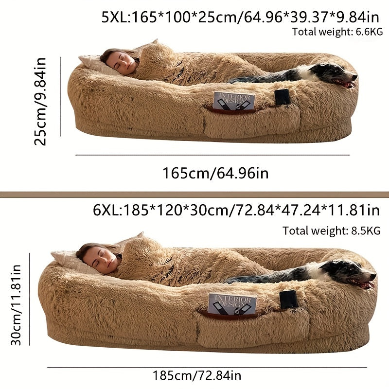 Oval-shaped plush sofa bed for dogs and people, cozy and warm with a non-slip bottom and machine washable in gray color.