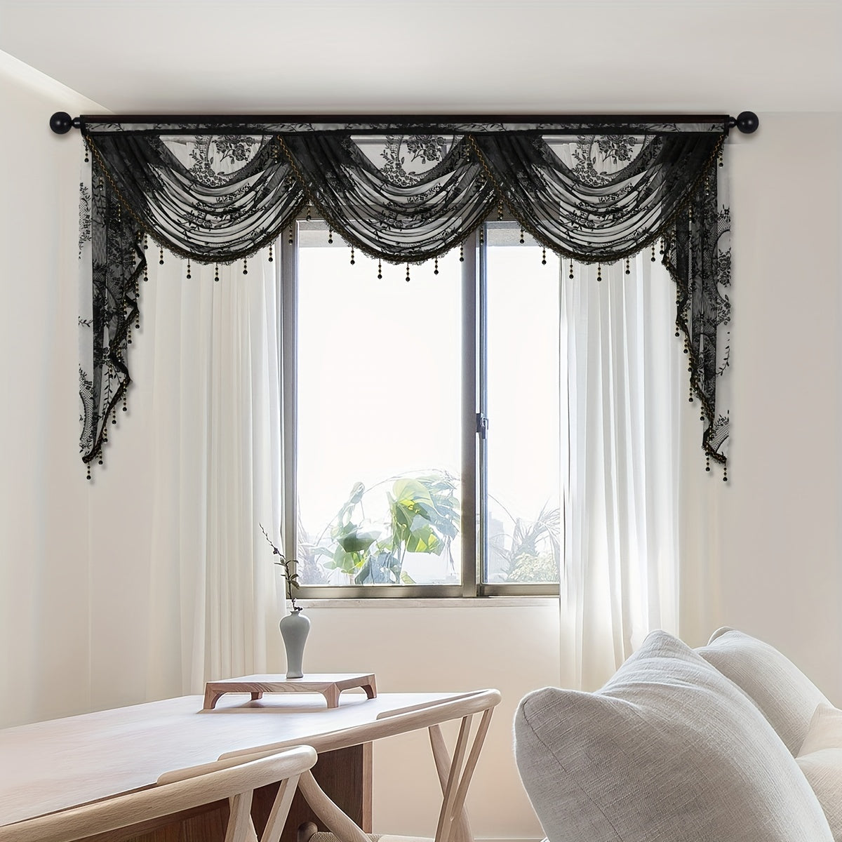 This European style wave curtain features a beautiful black lace valance with a flower pattern. The short curtain is designed with a rod pocket, making it suitable for windows and doors. Add a touch of elegance to your living room with this decorative