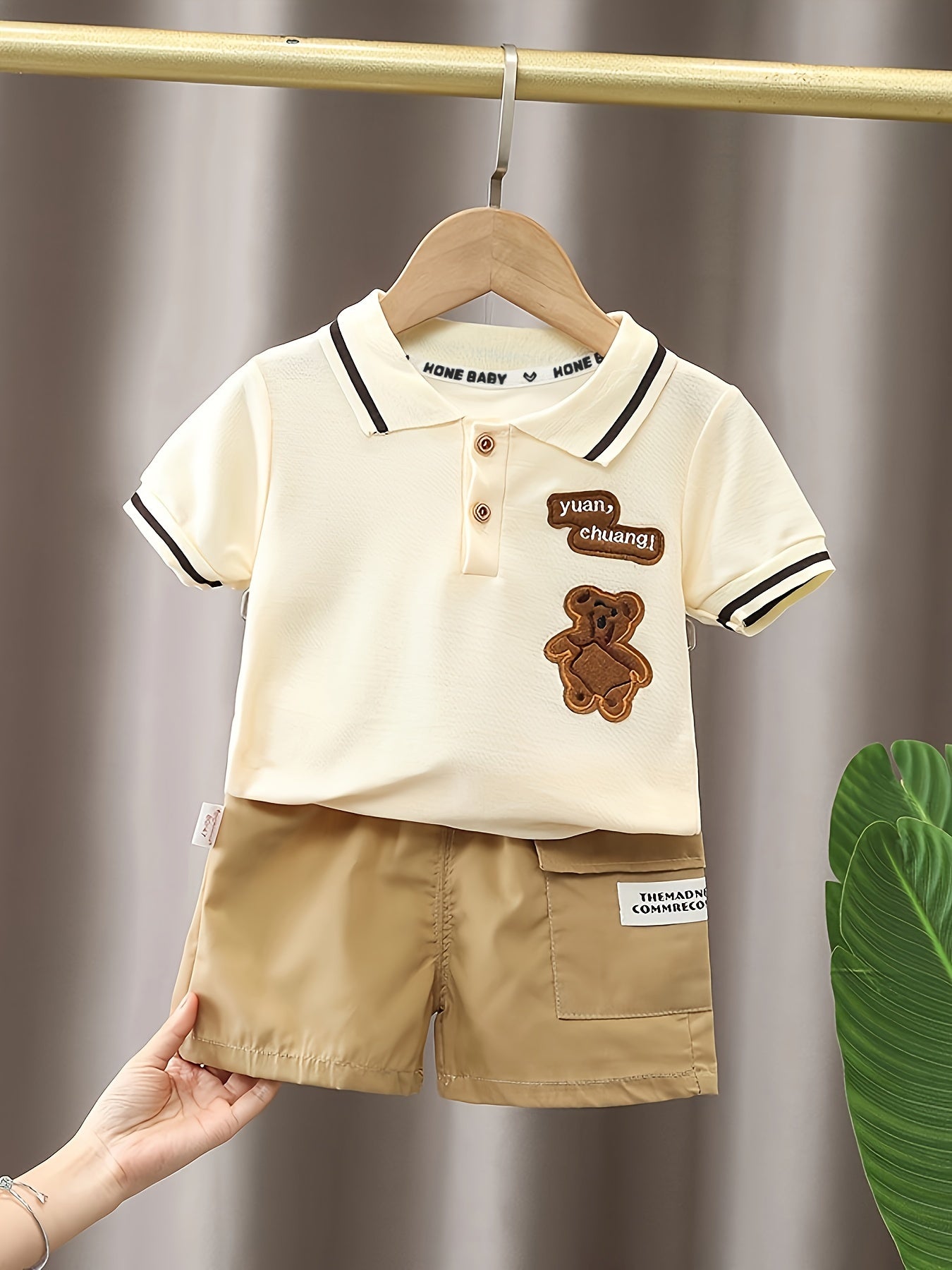 Infant boys' adorable bear embroidered summer outfit with short-sleeve golf shirt and pocketed shorts, perfect for outdoor activities.