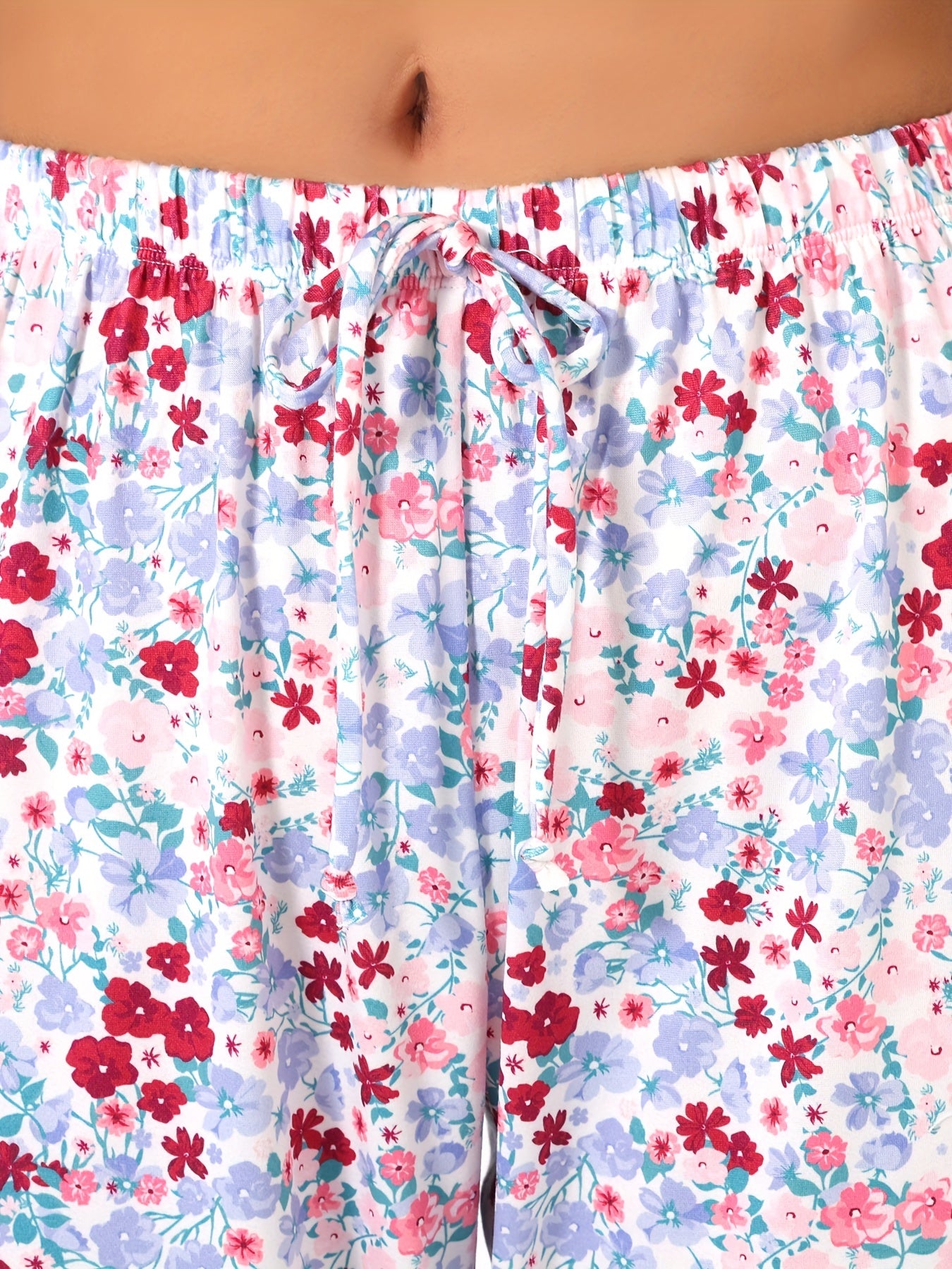 Floral print 2-piece pajama set for women with round neck top and shorts, perfect for summer sleepwear.