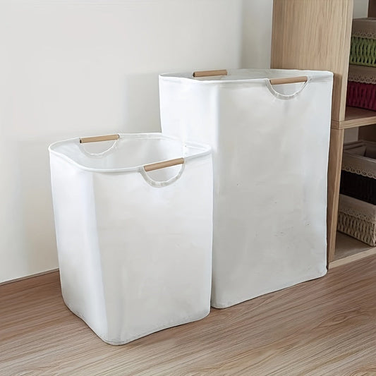 A foldable laundry basket that is perfect for storing dirty clothes, whether it be in the bathroom or in the laundry room. Made of fabric, this portable storage solution is both practical and stylish.