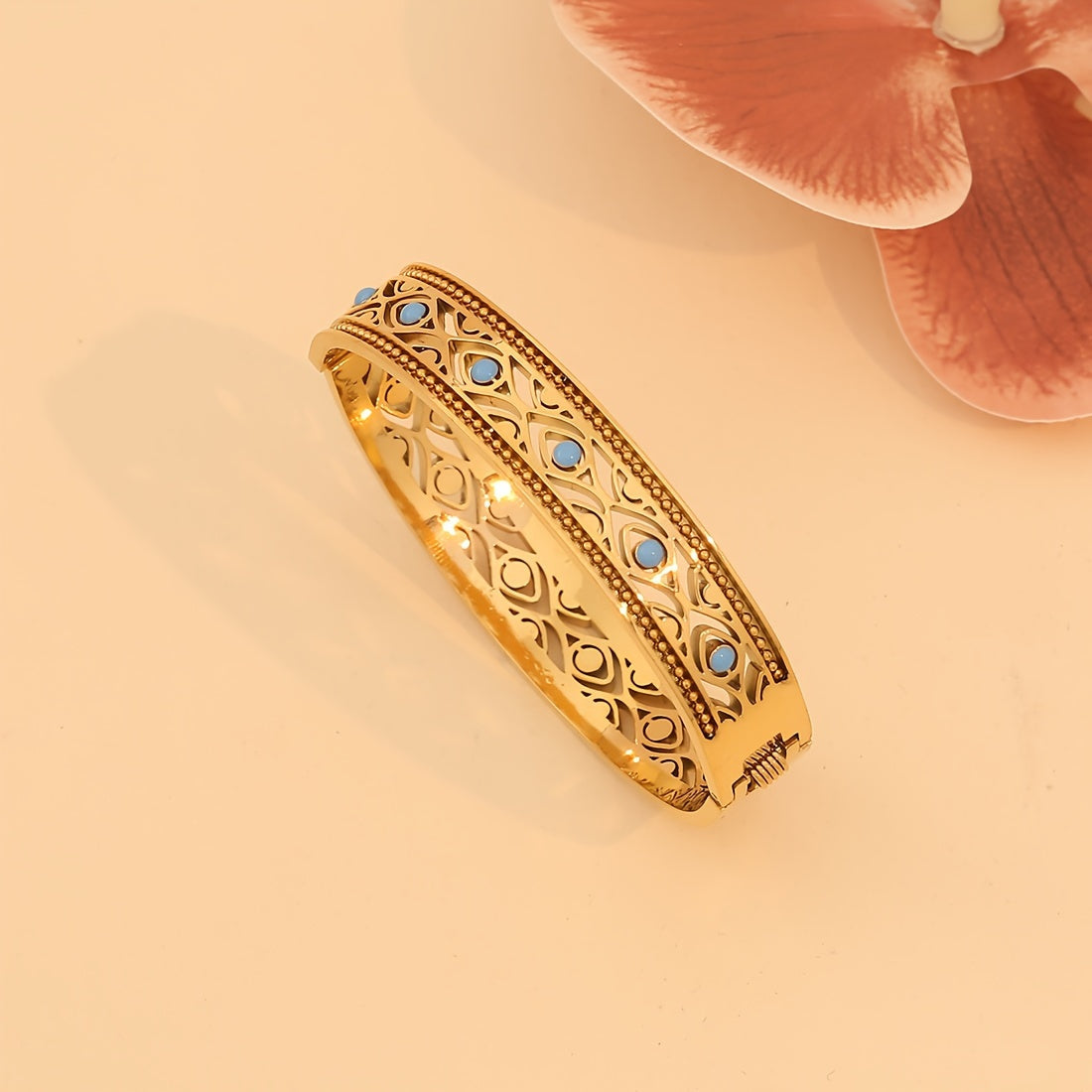 1pc of Vintage Style 18K Golden Plated Stainless Steel Bracelet featuring Turquoise Inlay and Hollow Pattern Design, specially designed for women as a Daily Wear Jewelry piece. This bracelet is the perfect Valentine's Day Gift.