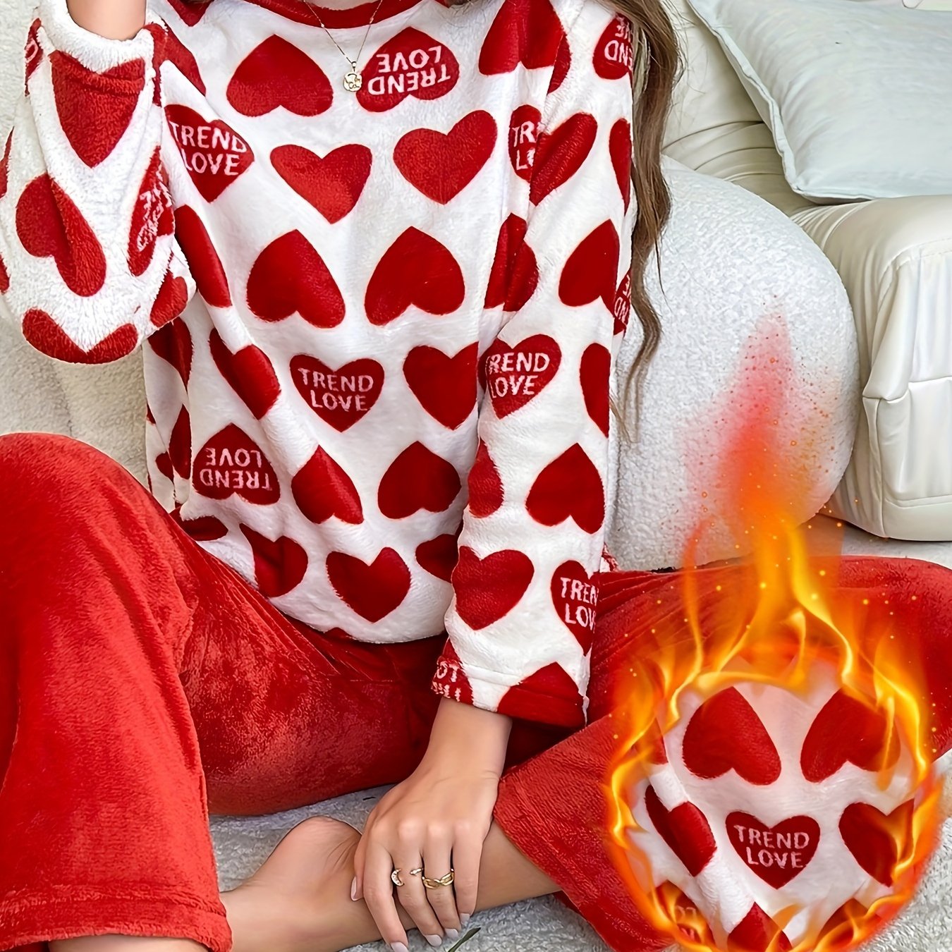 Cozy lounge set for women featuring heart and letter print, perfect for fall and winter. Includes long sleeve top and pants with a relaxed fit.