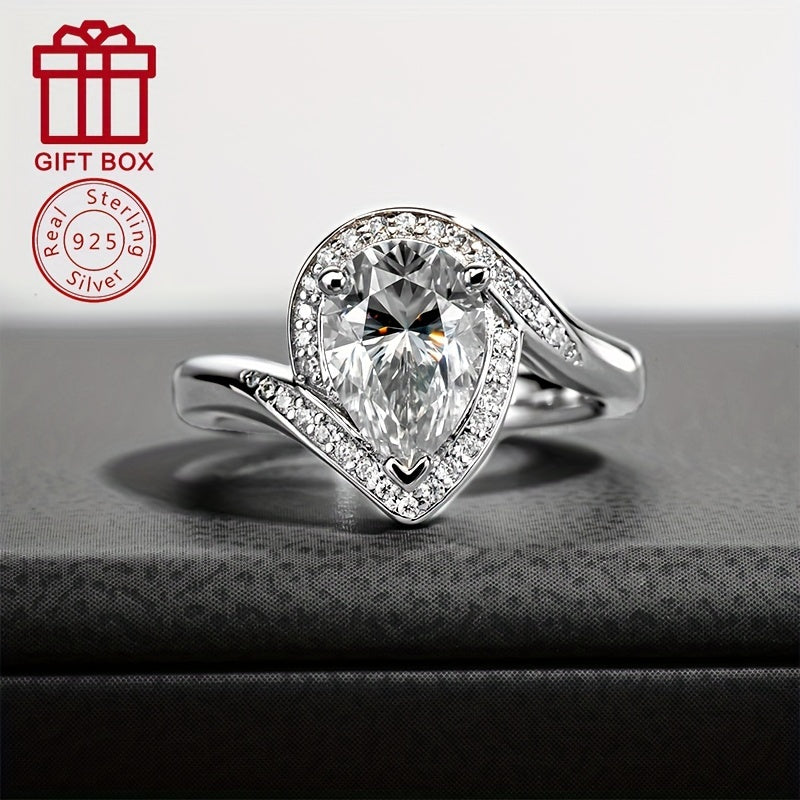 A beautiful and stylish 925 Sterling Silver Moissanite Teardrop Ring, featuring a stunning 7x10mm 2.5CT stone. Perfect for anniversaries, promises, engagements, and weddings, this simple yet elegant ring is ideal for women. It also makes a wonderful