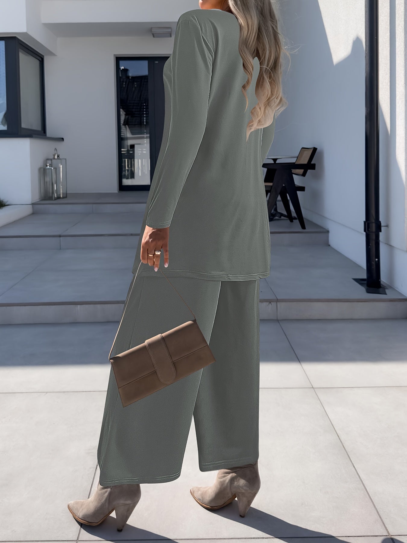 Women's suit set includes solid color split round neck sleeveless vest top, long sleeve open coat, and wide leg pants.