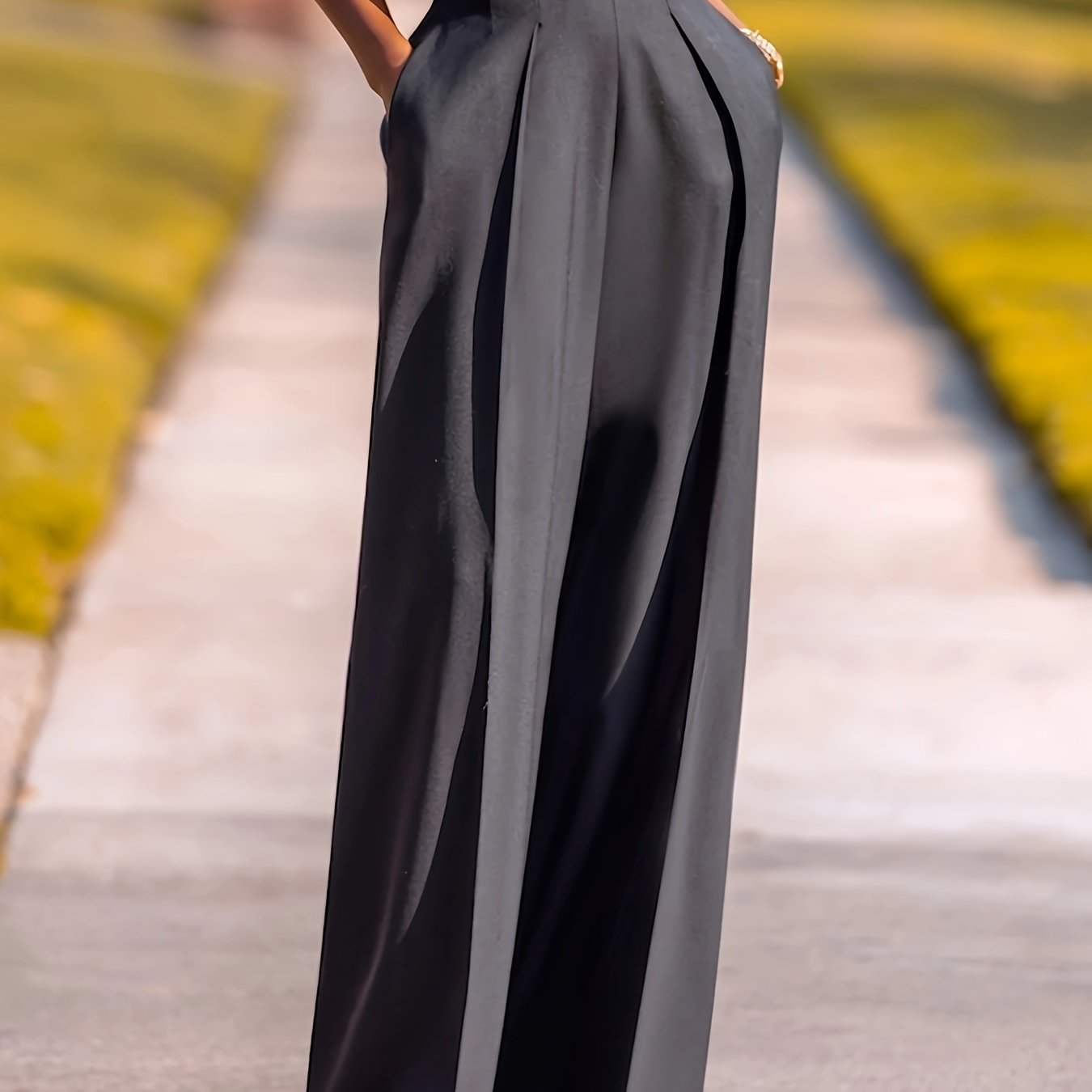 Women's wide leg pants in solid color, made from polyester elastane blend with pocket details for casual wear in spring and summer.