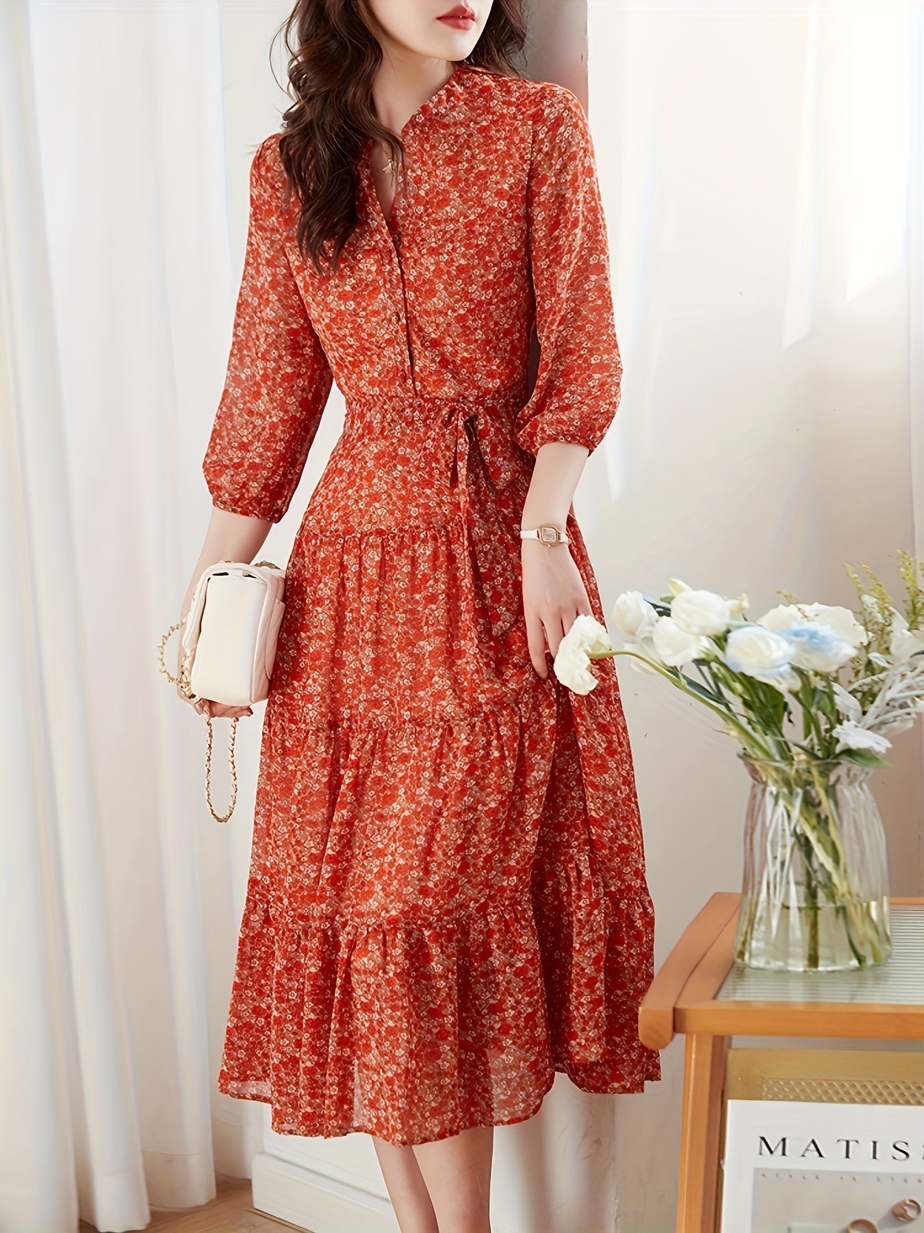 Elegant red floral chiffon maxi dress for women with a flattering slimming effect, complete with a belt.