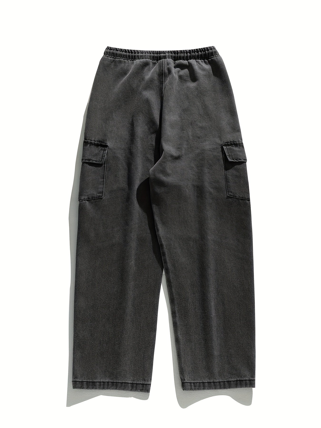 Men's cargo pants with multiple pockets and drawstring, ideal for outdoor activities in spring and fall.