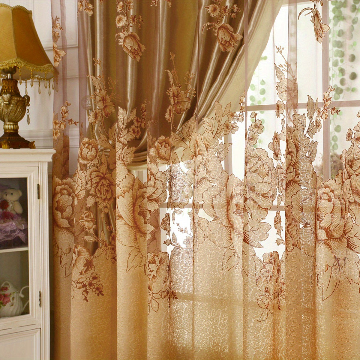 This sheer curtain features a delicate flower pattern on a single layer of translucent material, giving it a pastoral style. It is rod pocketed and does not come with a cloth lining, making it suitable for adding a touch of elegance to your living room