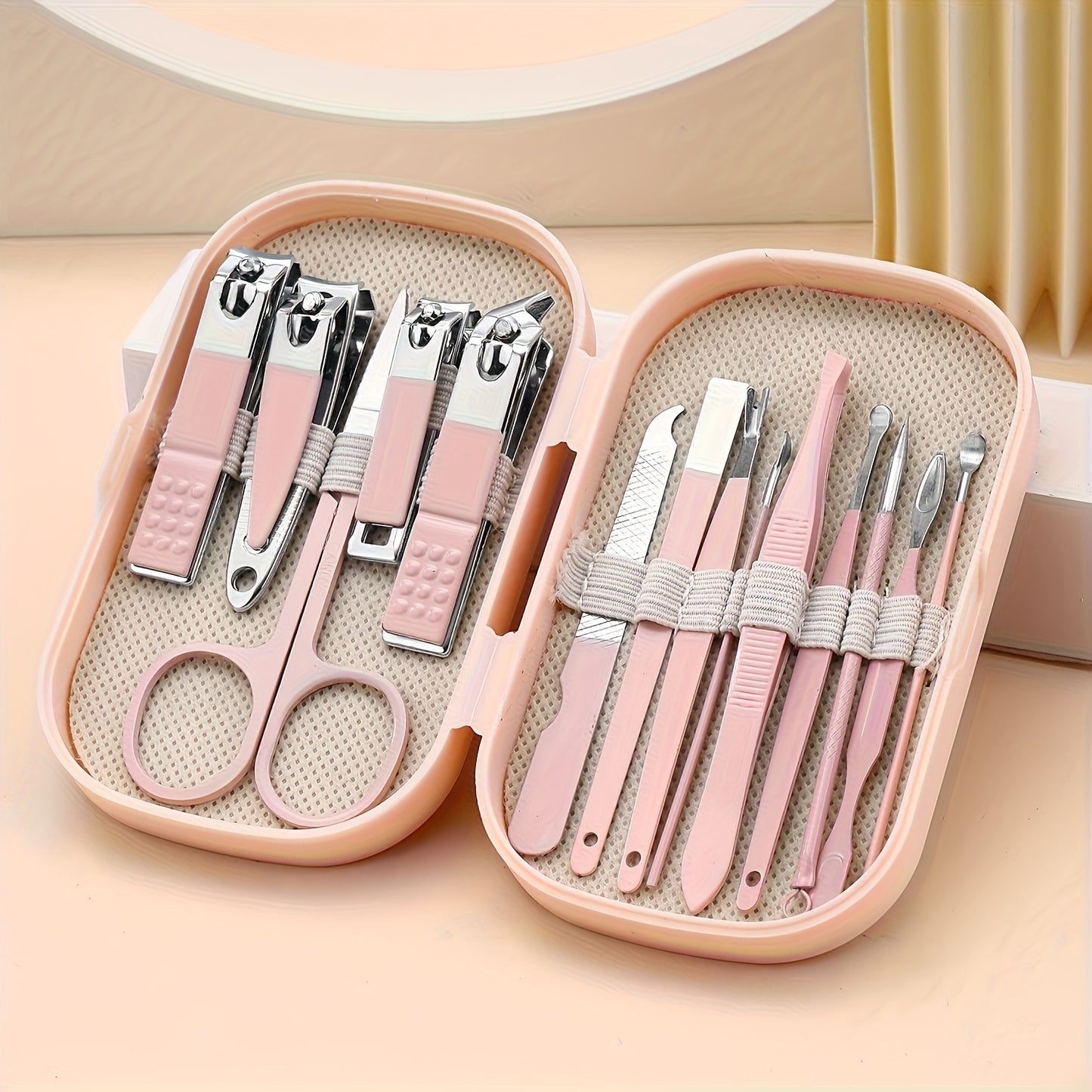 Modern 14pcs stainless steel nail and foot care tools set in portable storage box. Includes nail clippers and shaping tools. Unisex, fragrance-free, lightweight. No electricity or batteries