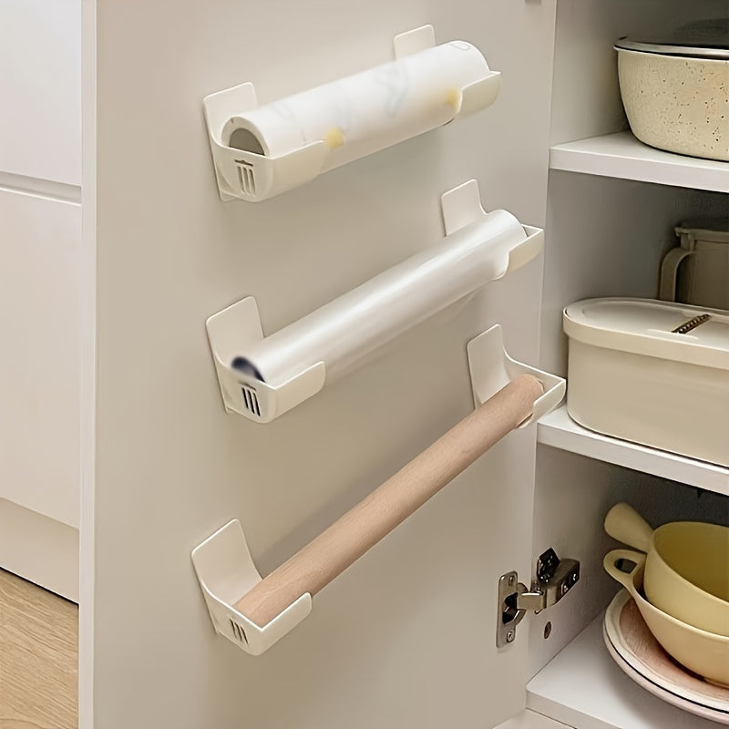 Easy to install without drilling, these 4 kitchen storage racks are perfect for organizing cling film, garbage bags, and more. Made of plastic, they have a sleek white design and adhesive backing for use on cabinets, refrigerator sides, and more. Keep