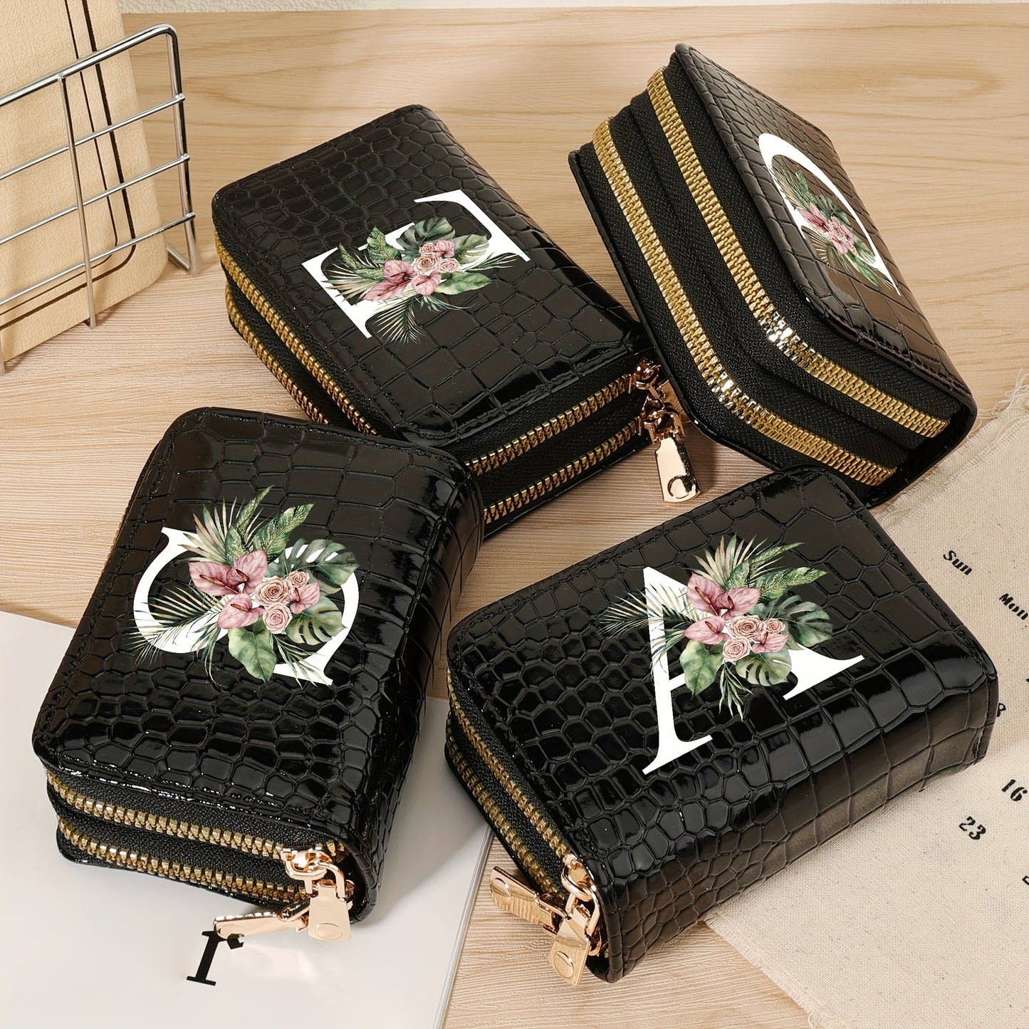 Women's credit card wallet with elegant floral letter print in black & white. Features large capacity, dual zipper, crocodile texture PU, lightweight design with nylon lining for everyday