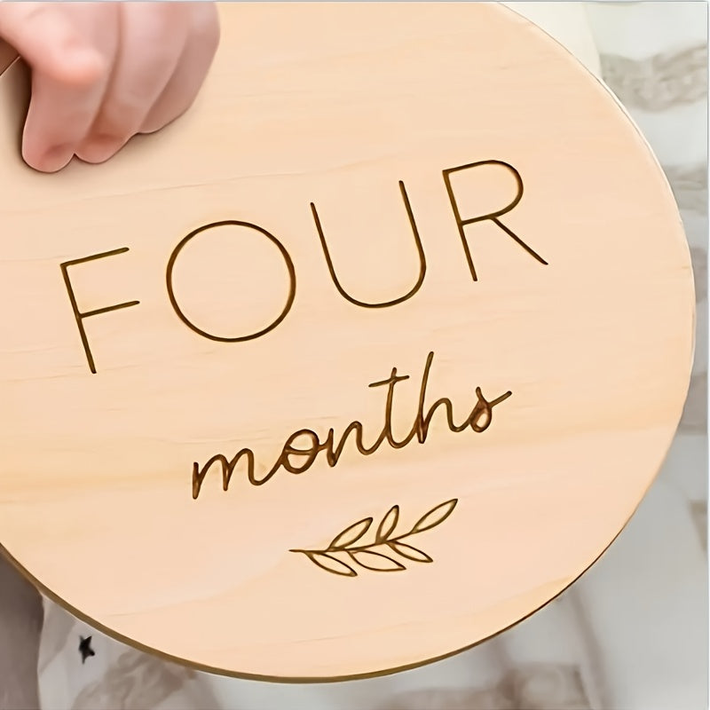 Celebrate baby's first year with the Yuebaaf 7-piece Reversible Wooden Milestone Cards Set! This set includes milestone cards featuring 'Hello World' and Announcement signs, perfect for monthly photo props. Made from durable fiberboard discs, these cards