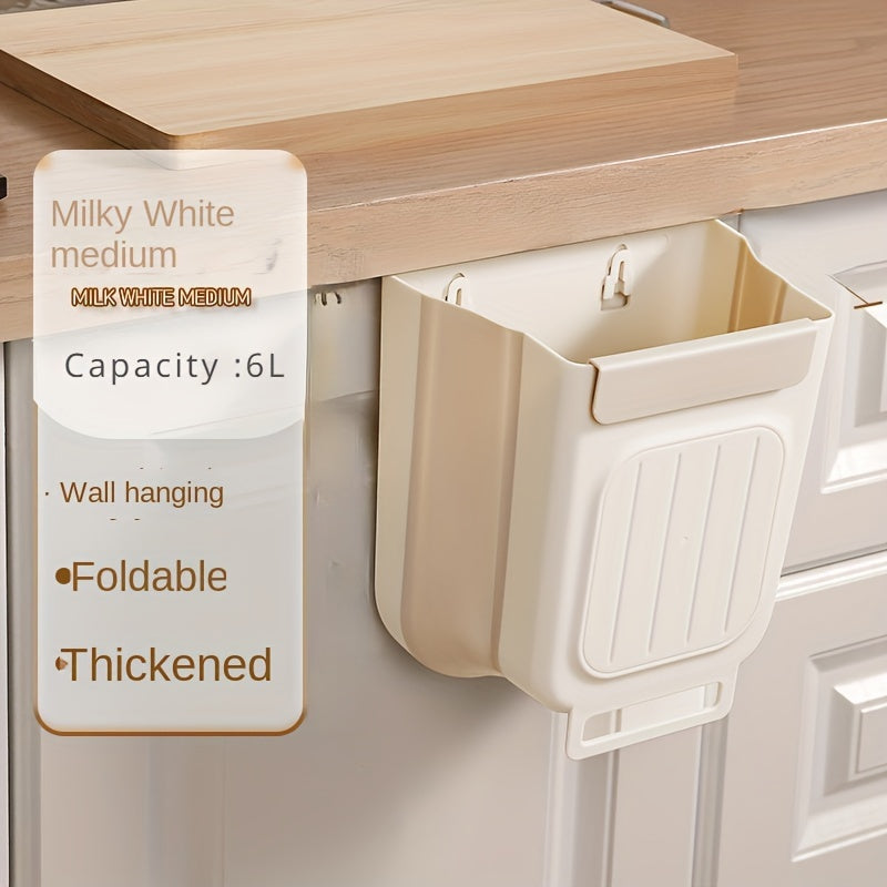 Thickened, foldable kitchen trash can hangs inside cabinet for storage without bending.