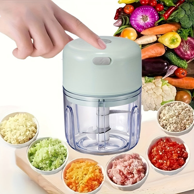 Electric mini garlic chopper that can crush ginger and vegetables, with USB meat grinder and sturdy build, 100/250ml capacity, ideal for kitchen use.