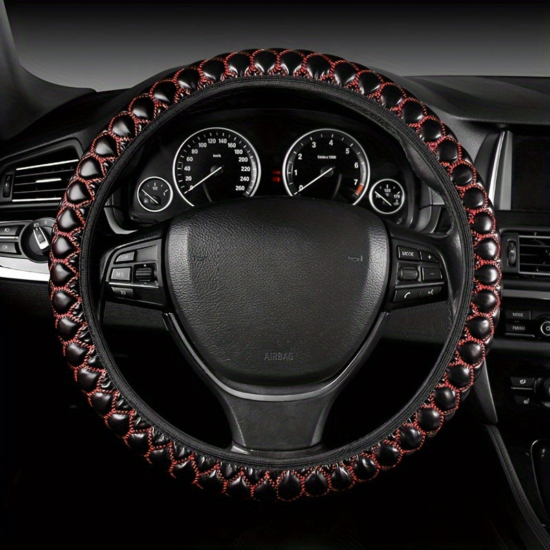 Luxurious embroidered faux leather steering wheel covers with anti-slip grip, universal fit. Comfortable and durable accessory for your vehicle.