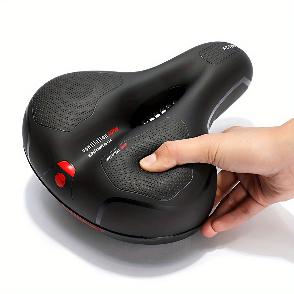 Wide comfortable bike seat cushion with memory foam padding and dual shock absorption, suitable for men and women on stationary, exercise, mountain, and road bikes.