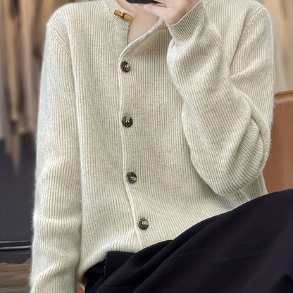 Stylish plus size knit cardigan with button detail, round neck, and stretch fabric for women. Ideal for autumn/winter.