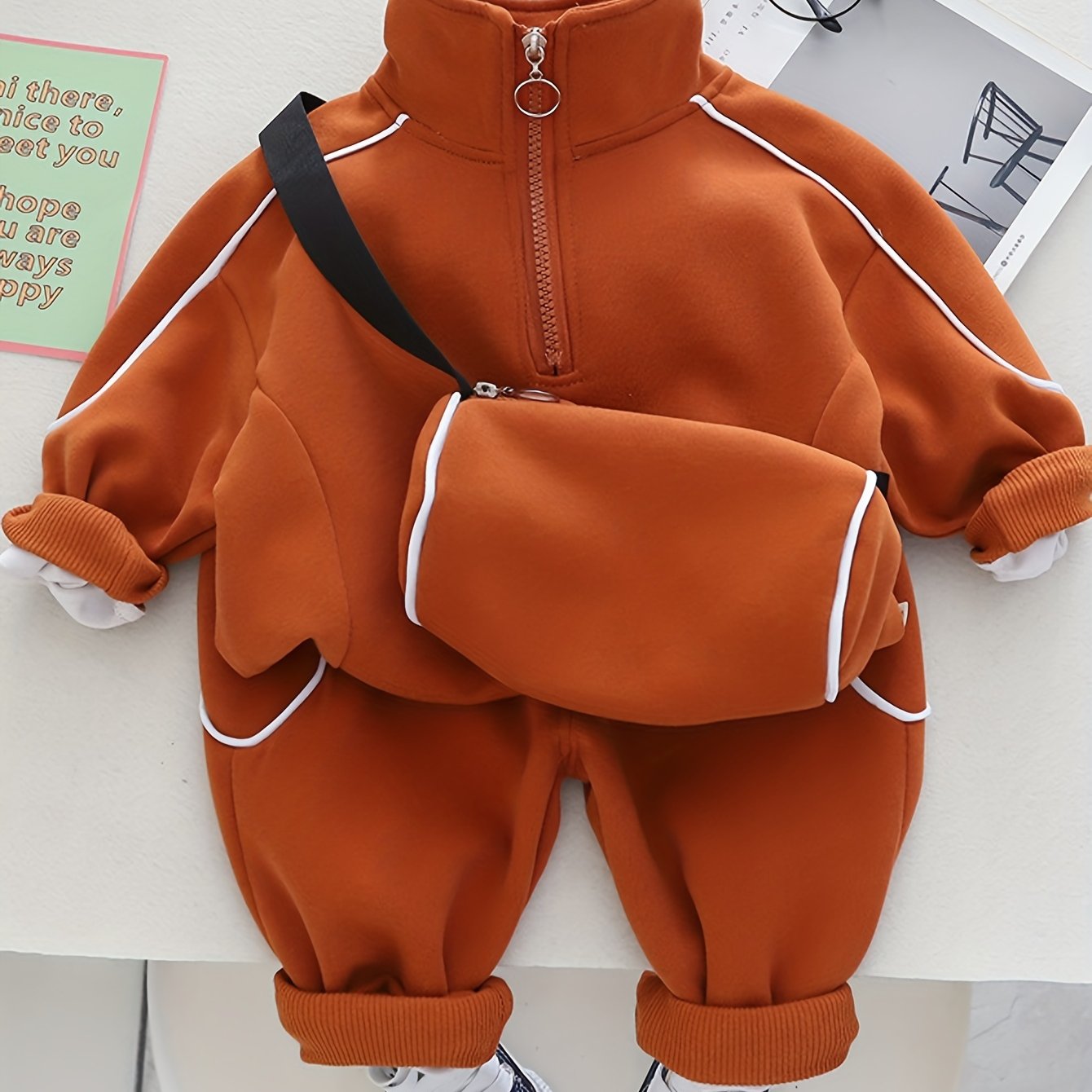 Trendy boys' sports casual outfits with zip-up stand collar sweatshirt and pants set, including a free satchel bag. Perfect for outdoor activities.