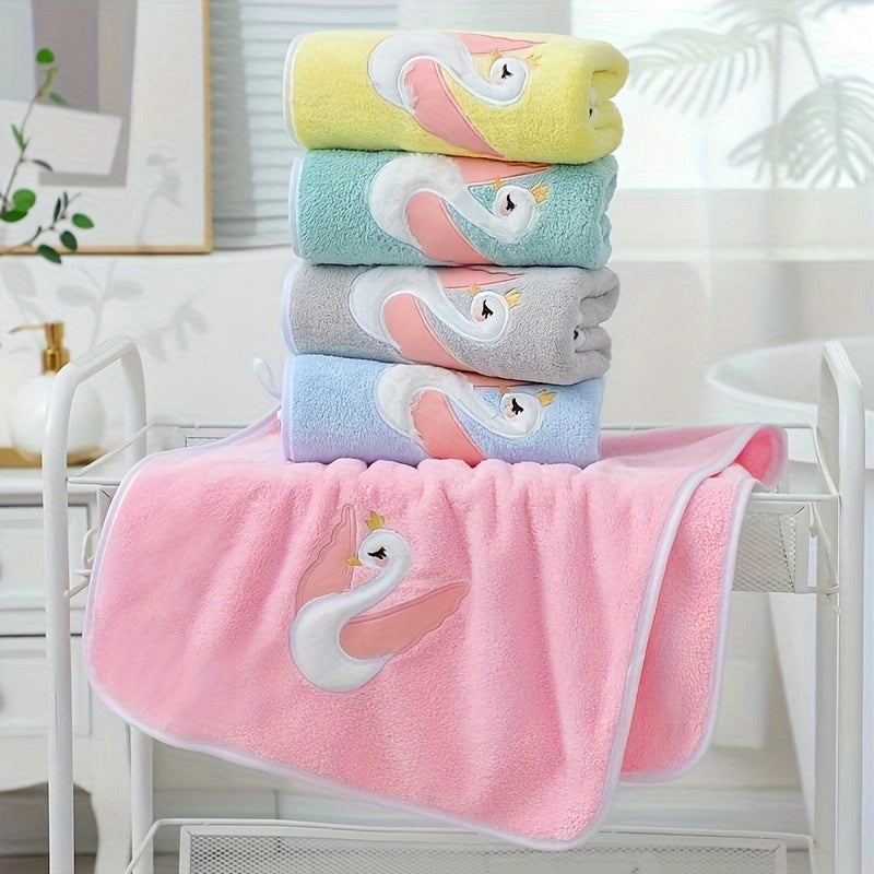 A 75*35cm Cartoon Swan Kid's Bath Towel with premium softness, absorbency, and quick-drying capability, ideal for use in the bathroom or at home.