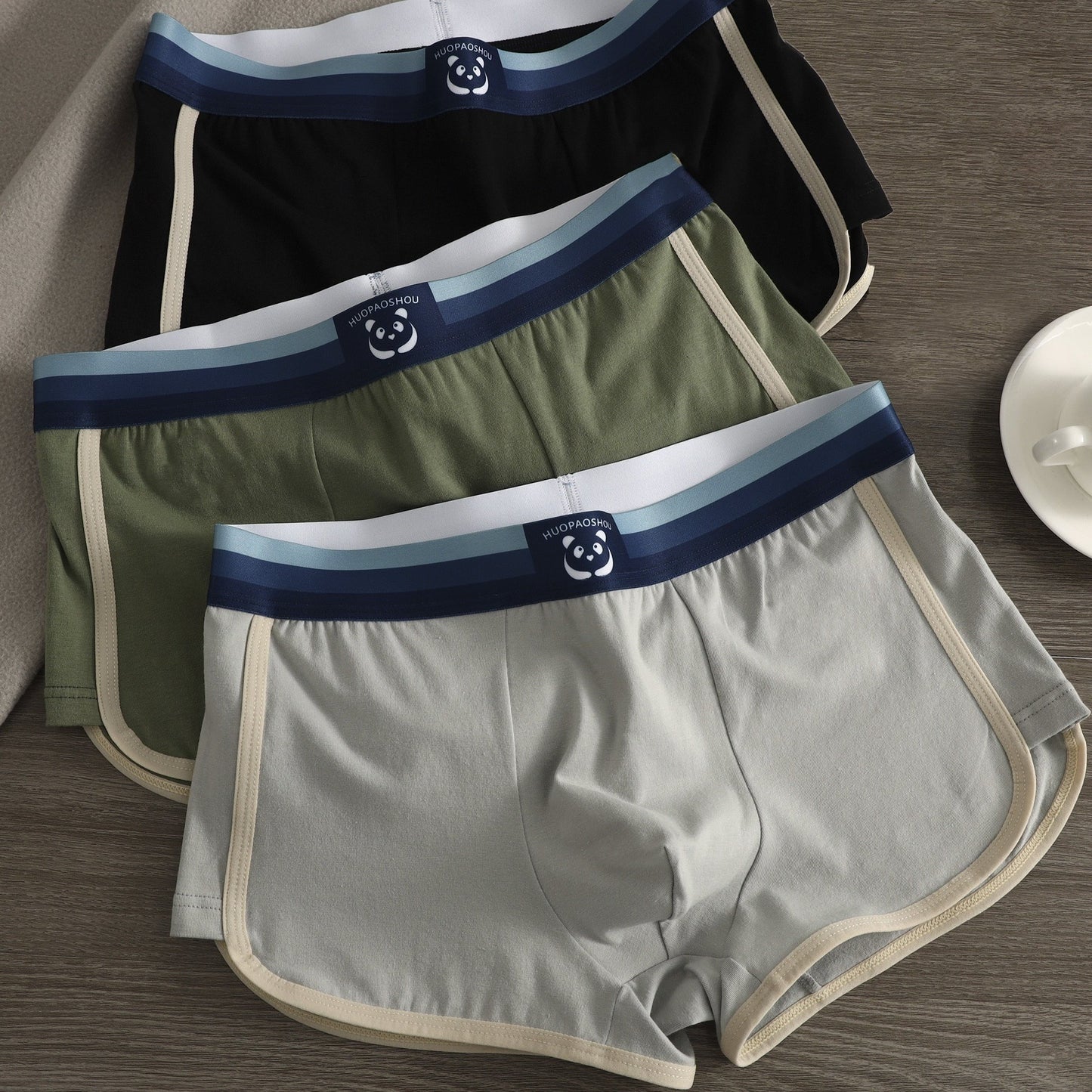 3 men's cotton boxer briefs for a comfortable fit with solid color, breathable, and stretchy material.