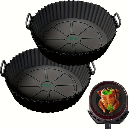 A pair of round silicone air fryer mats that are reusable, dishwasher safe, and can also be used as baking trays. These versatile mats are a must-have kitchen accessory for any home chef.