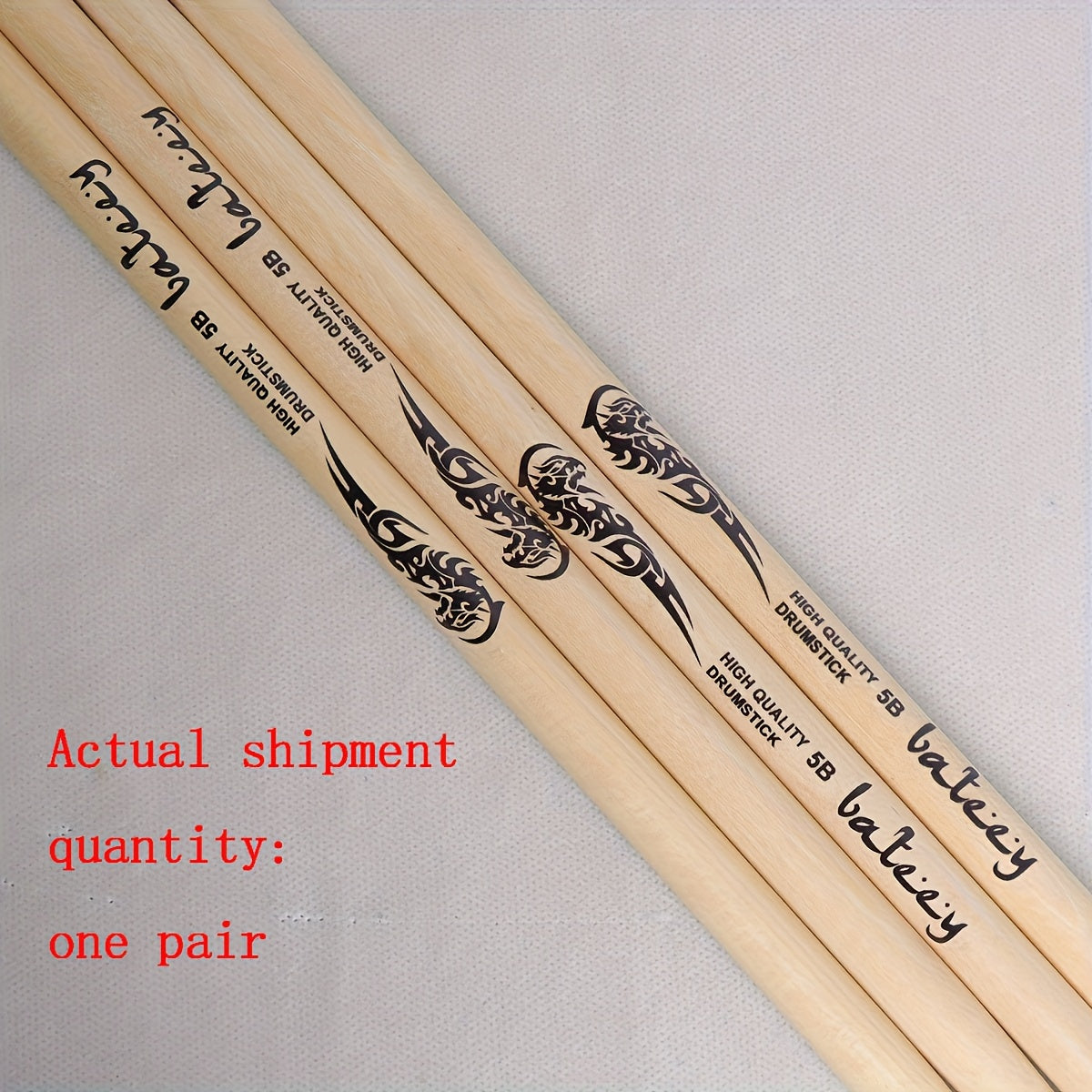 Lightweight drumsticks with totem design, selectable sizes 5A, 7A, and 5B. Made of high-quality natural wood with a precision grip, uncharged pair.