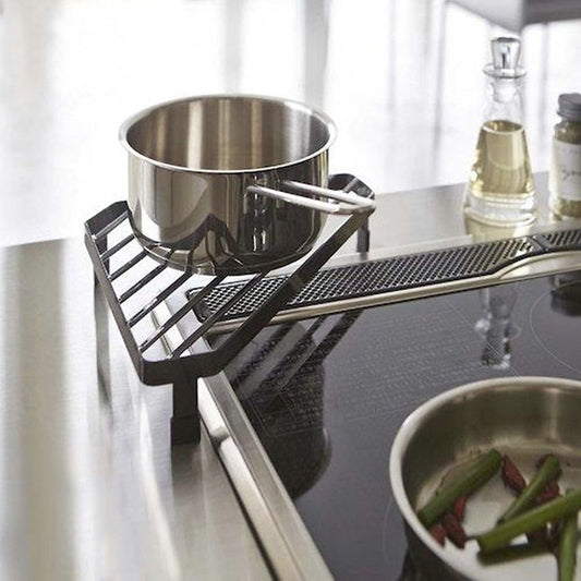 Triangle cast iron pot stand suitable for kitchen countertops, heat-resistant and anti-scald. Can be used as a corner floor storage rack with open design for organizing cookware without the need for drilling.