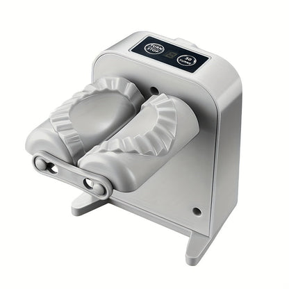 The Electric Dumpling Maker is a convenient appliance for your kitchen, making dumpling preparation quick and easy. It is compact, USB rechargeable, and features automatic press operation with 2-speed settings for 6 or 9 seconds. Includes a picking spoon