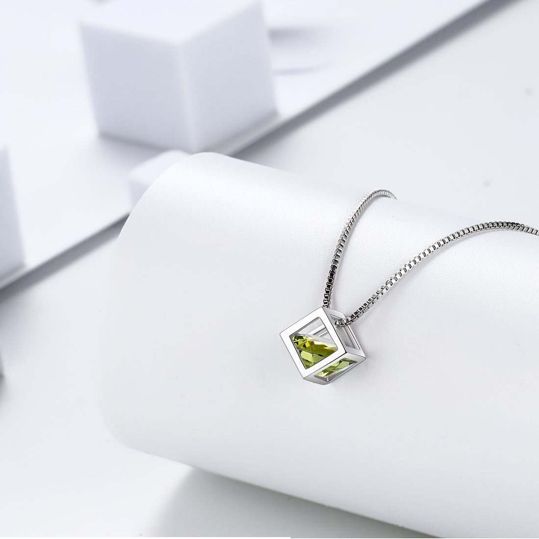 Necklace crafted from 925 Sterling Silver with a 3D Cube Crystal Pendant and Cubic Zirconia accents. Perfect for women, this piece of jewelry exudes elegance and style in a stunning silvery hue.