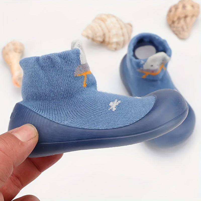 Cute slip-on baby sock shoes with non-slip soles for newborns and toddlers in blue, yellow, pink, and brown.