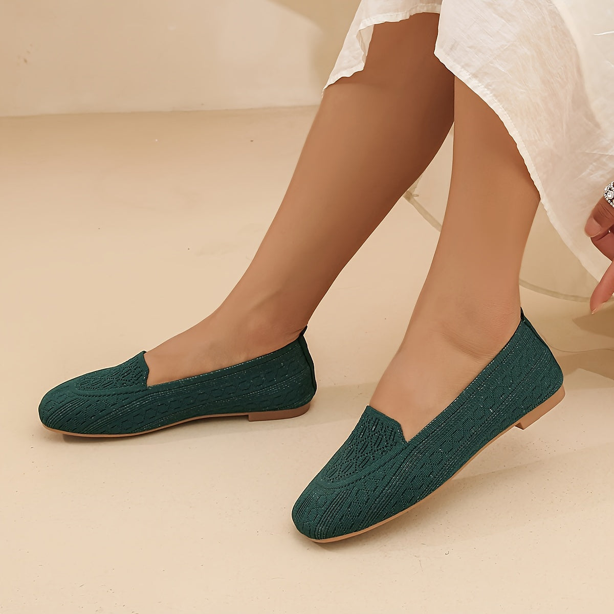 Breathable knit slip-on loafers with square toe, perfect for casual wear.