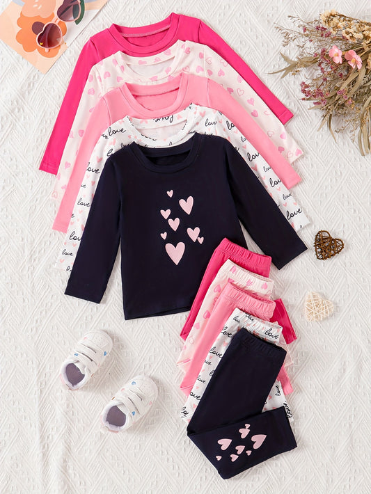 10-piece girl's casual long-sleeved top and pants set with cute love letter and print. Comfortable stretch fabric, suitable for daily wear or outdoor activities in spring and autumn.