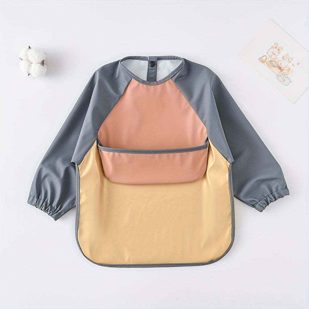 Long-sleeved reverse dressing bib for eating, with a super soft waterproof pocket for feeding.