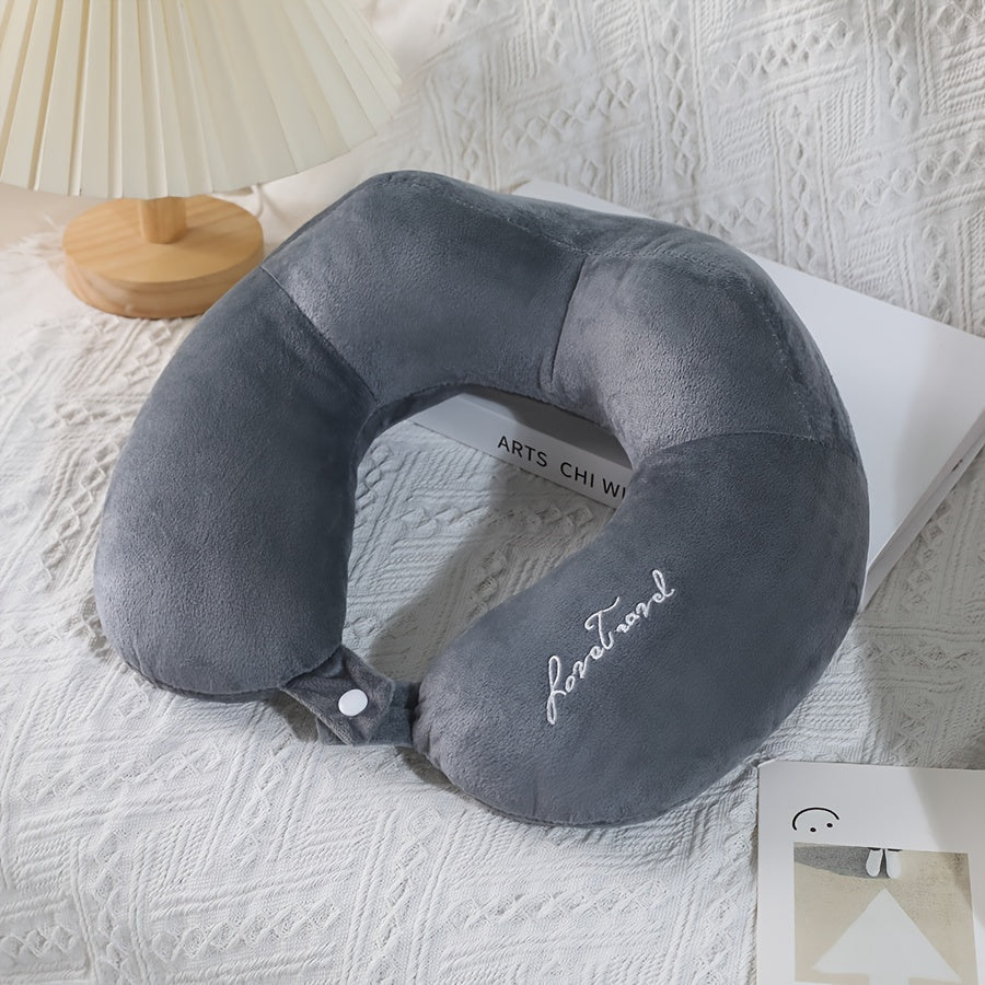 Soft and portable travel pillow in U shape, perfect for neck support on planes, trains, and cars. Ideal for a comfortable rest while traveling.