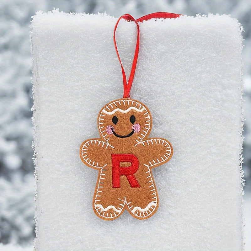 Embroidered gingerbread man ornament for Christmas decoration, made of fabric material. Classic style and no power required. Perfect for home and kitchen use.