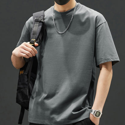 Loose 100% cotton men's T-shirt for summer outdoor wear.